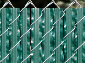 Ultimate Privacy Slat Pictured installed with a 2" diamond chain link fence